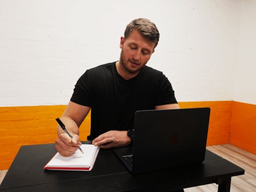 OriGym student completing online pt course OriGym student completing online pt course